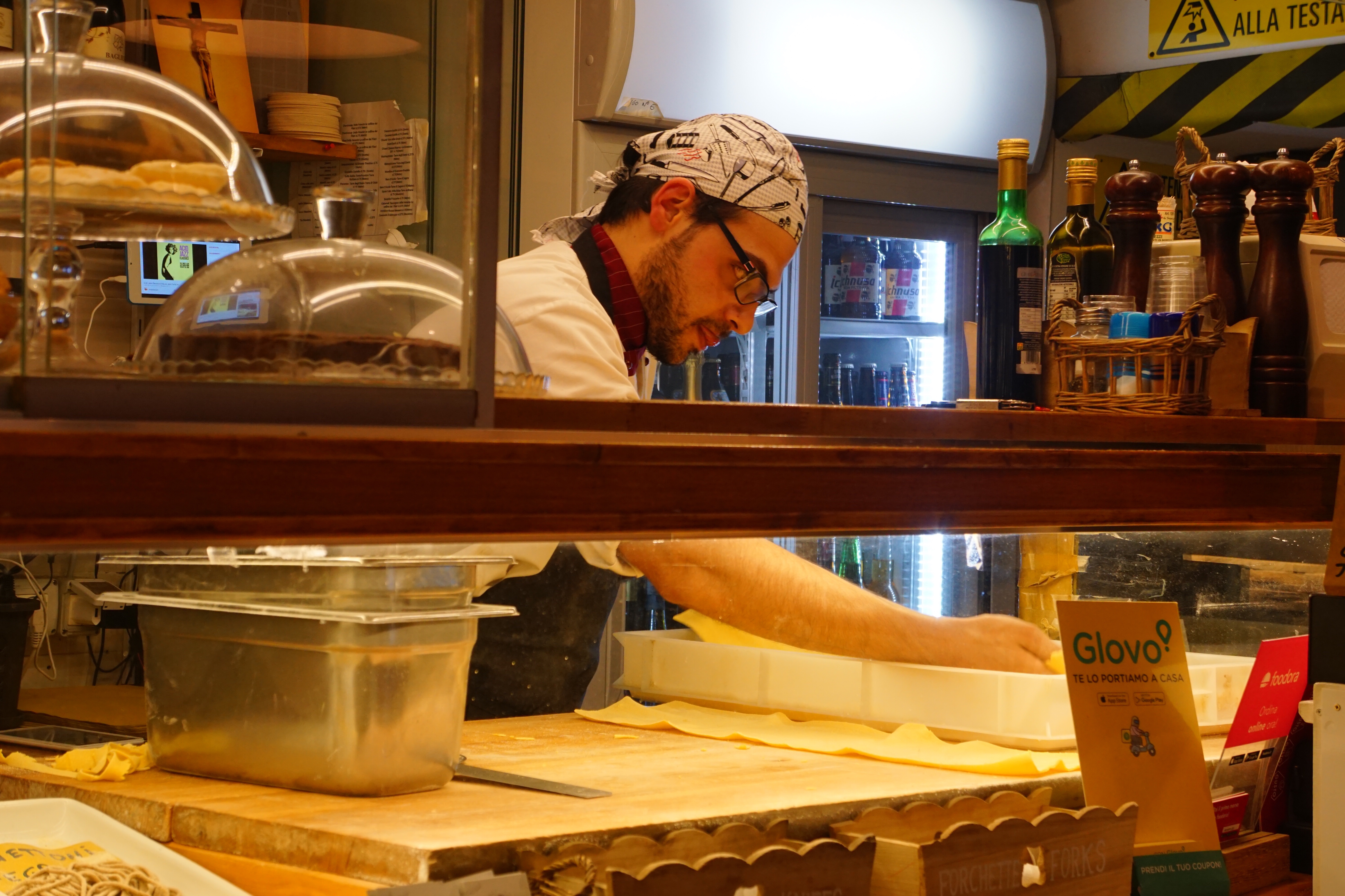 Man making handmade pasta in Rome 